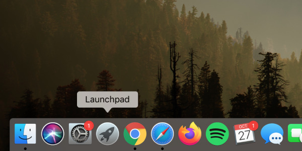 Grey circle with rocketship “Launchpad” icon in Mac dock at bottom of screen highlighted 